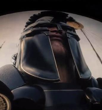 A picture of Agamemnon from Nolan's Odyssey, but the perspective is warped so the bottom of the picture is wide and the top is narrow.